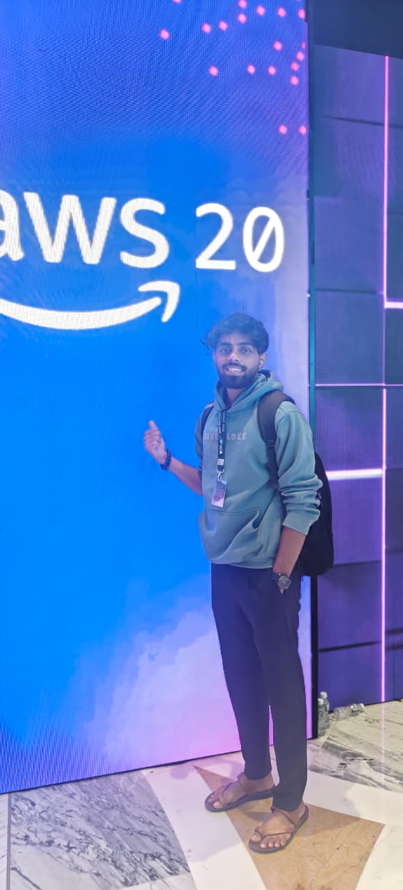 Suraj at the AWS 2026 sign
