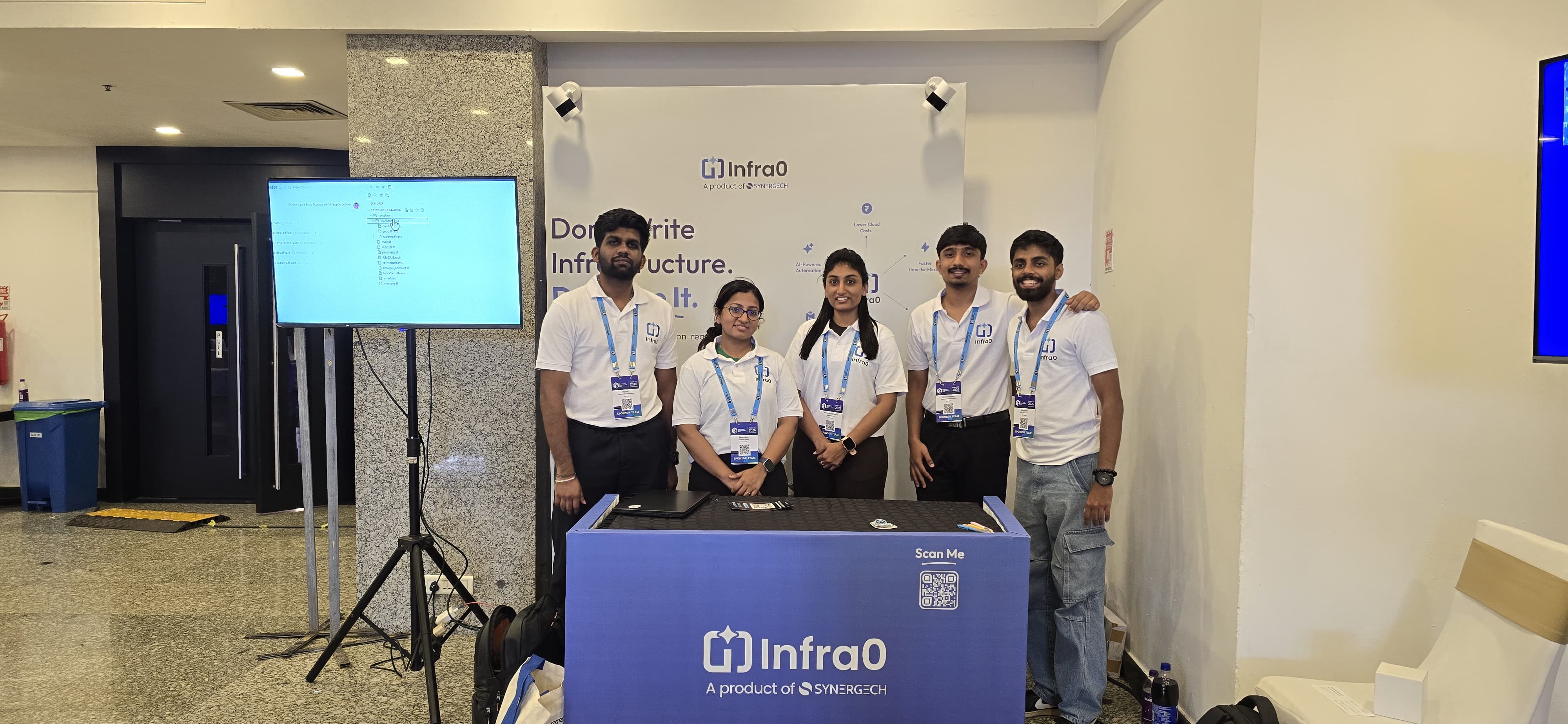 The infra0 team at their booth at Cloud Native Summit Kerala 2026